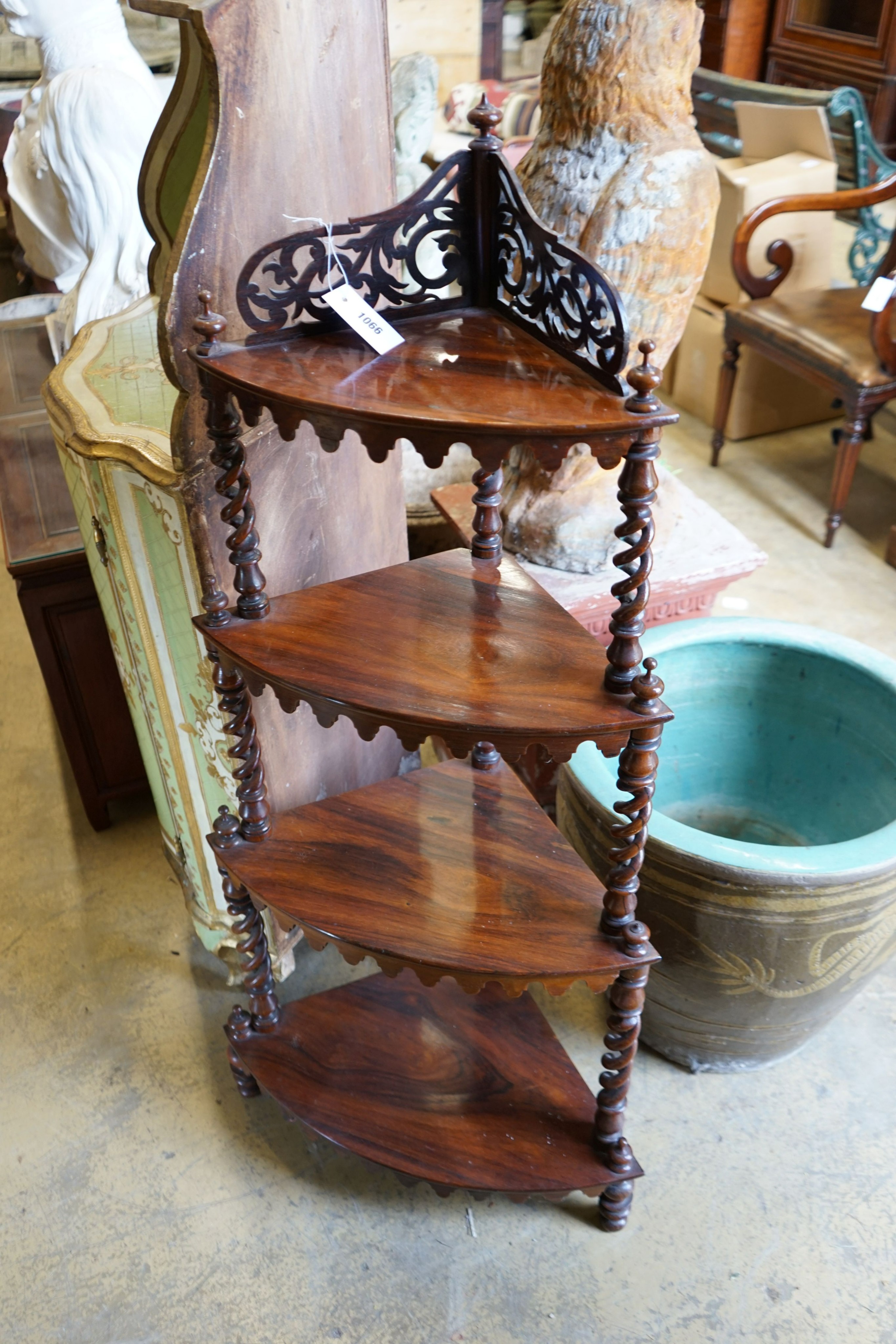 A Victorian rosewood bow front four tier corner whatnot, width 58cm, depth 36cm, height 122cm